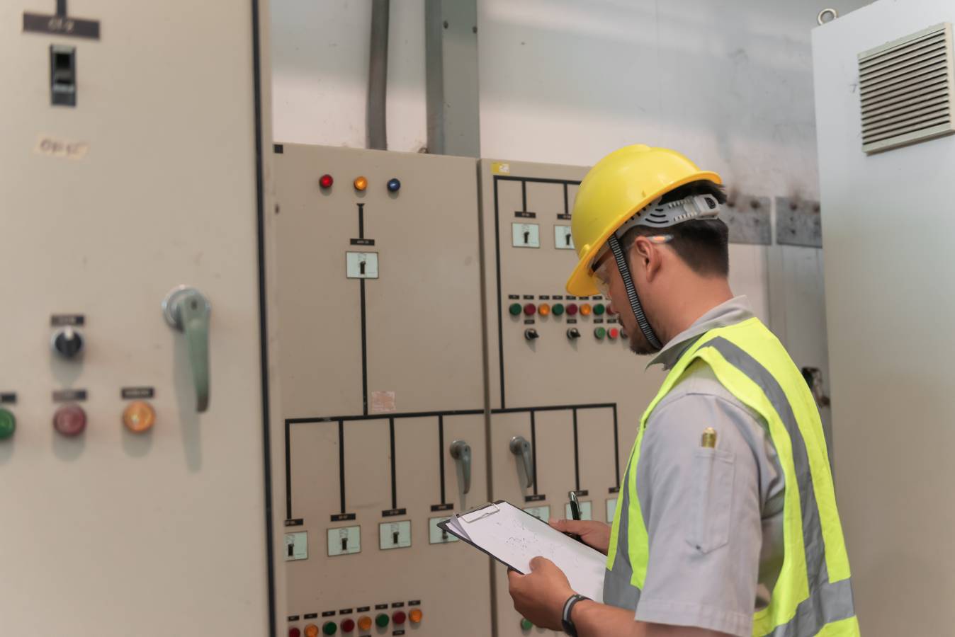asian-electric-engineer-holding-clipboard-checking-monitoring-electrical-system-control-roomtechnician-thailand-people-working.jpg