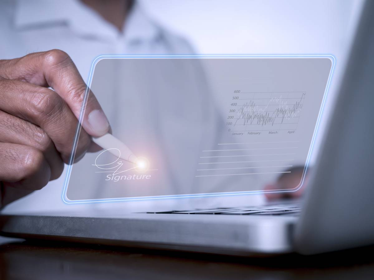 businessman-use-electronic-pen-sign-signature-electronic-esigning-data-sheet-document-management-paperless-office-concept-businessman-using-stylus-pen-signing-e-document-digital-tablet.jpg