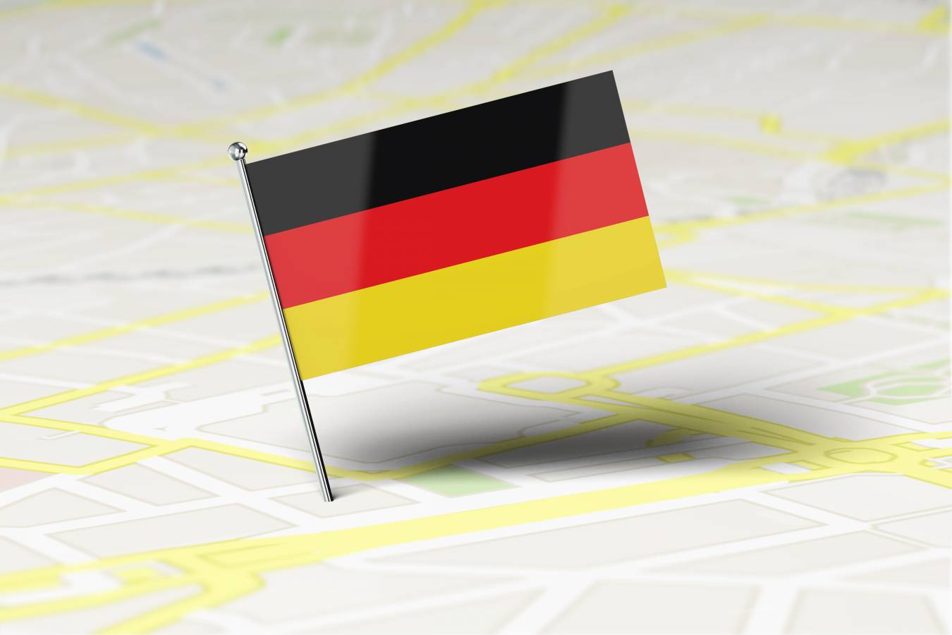 germany-national-flag-location-pin-stuck-into-city-road-map-3d-rendering.jpg