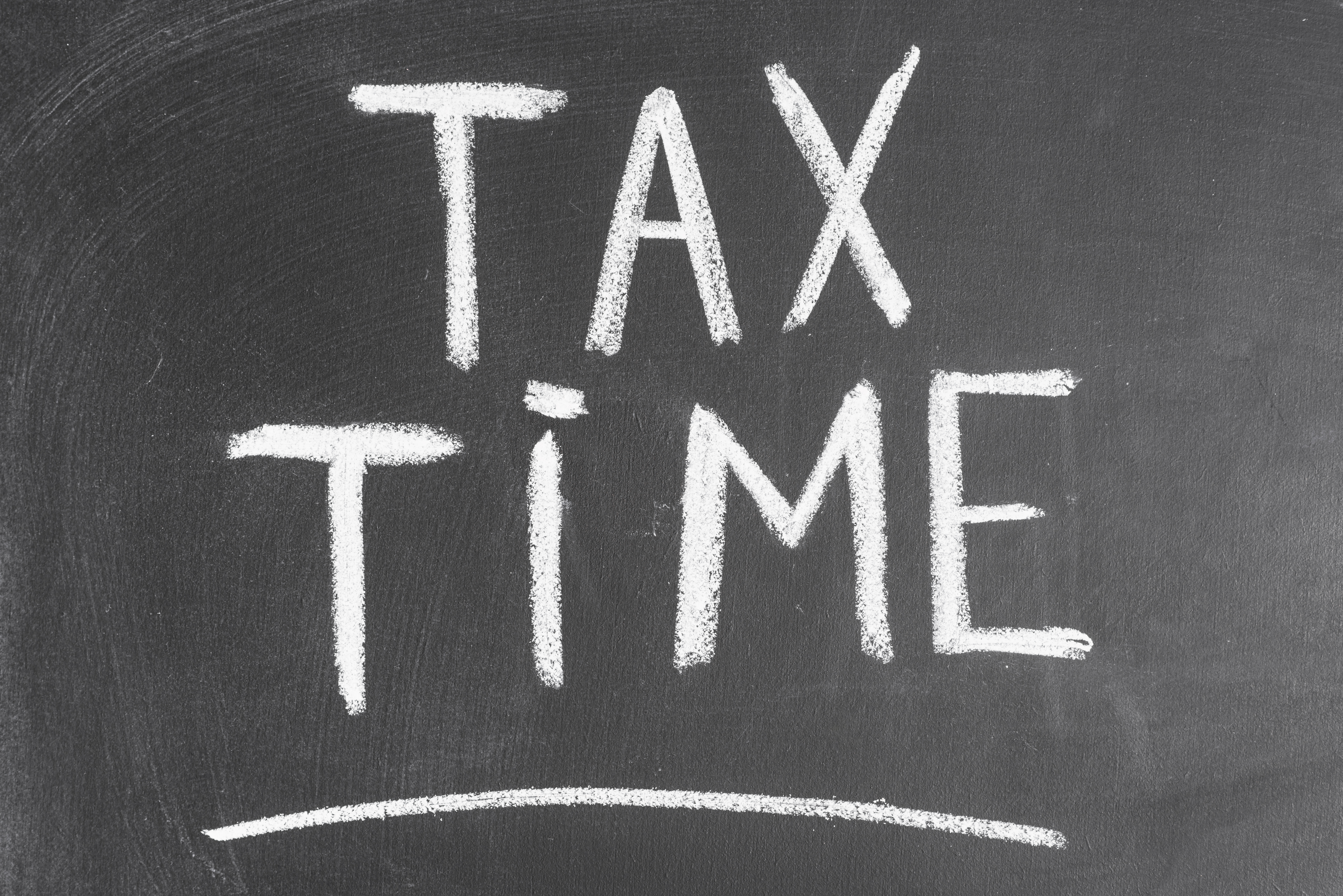 tax-time-written-black-backboard-with-chalk.jpg
