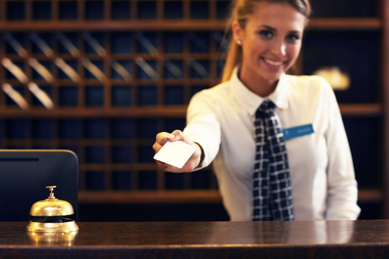 receptionist-giving-key-card.jpg